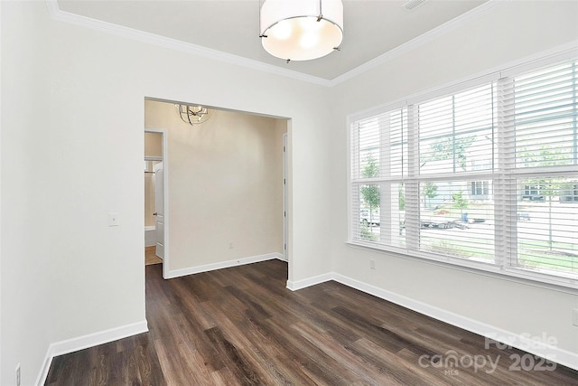 163 Crenshaw Pl NW, Concord, NC 28027 - spare room featuring plenty of natural light, dark wood finished floors, crown molding, and baseboards
