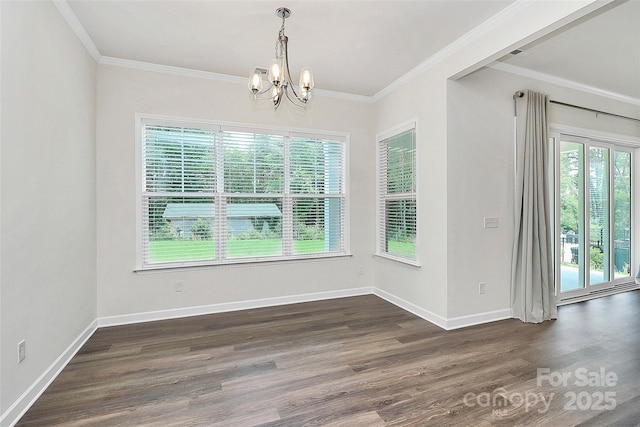 163 Crenshaw Pl NW, Concord, NC 28027 - unfurnished dining area with healthy amount of natural light, a chandelier, wood finished floors, baseboards, and crown molding