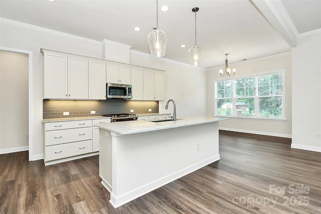 163 Crenshaw Pl NW, Concord, NC 28027 - kitchen with a sink, stainless steel microwave, stove, dark wood-style floors, and tasteful backsplash