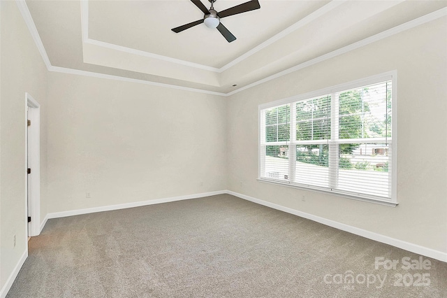 163 Crenshaw Pl NW, Concord, NC 28027 - carpeted empty room with crown molding, a ceiling fan, a tray ceiling, and baseboards