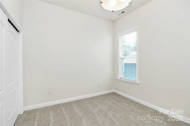 163 Crenshaw Pl NW, Concord, NC 28027 - unfurnished room with light carpet and baseboards