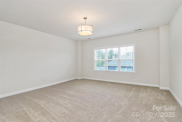 163 Crenshaw Pl NW, Concord, NC 28027 - carpeted empty room with baseboards