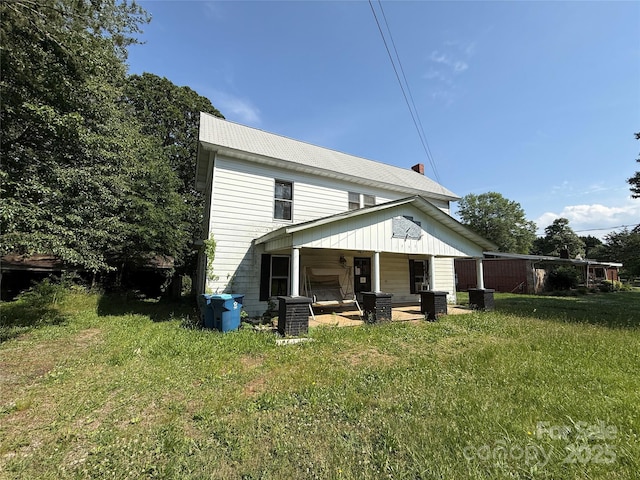 1445 33rd St SW, Hickory, NC 28602 - back of house featuring a yard