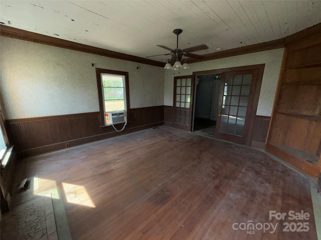 1445 33rd St SW, Hickory, NC 28602 - empty room with wood finished floors, a wainscoted wall, french doors, ceiling fan, and wood ceiling
