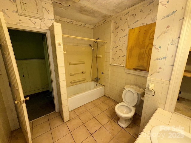 1445 33rd St SW, Hickory, NC 28602 - bathroom with tile patterned floors, toilet, shower / bath combination, and tile walls