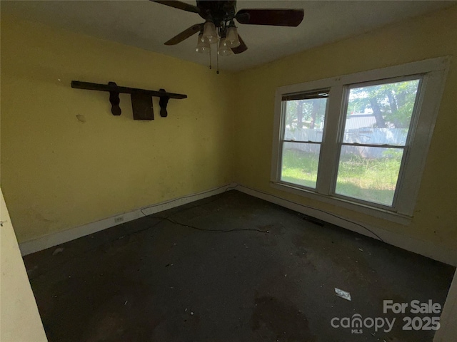1445 33rd St SW, Hickory, NC 28602 - empty room featuring ceiling fan and baseboards