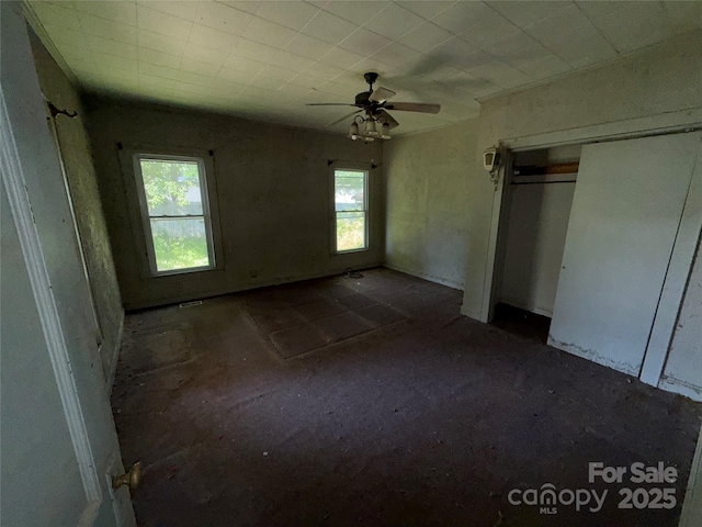 1445 33rd St SW, Hickory, NC 28602 - unfurnished bedroom featuring a closet and ceiling fan