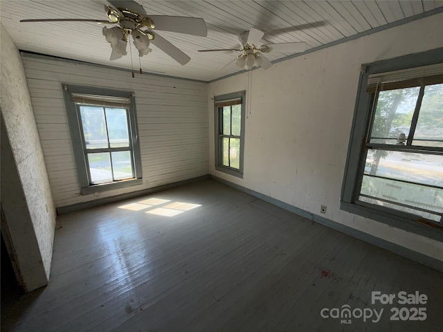 1445 33rd St SW, Hickory, NC 28602 - empty room with wood finished floors, a ceiling fan, baseboards, and wood ceiling