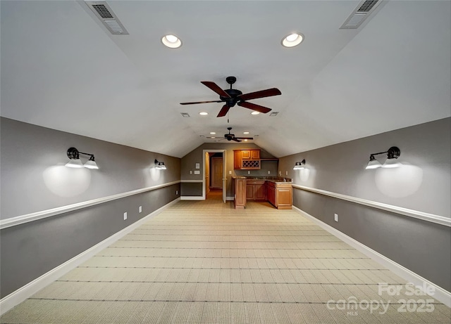 bonus room with a ceiling fan, baseboards, lofted ceiling, and recessed lighting