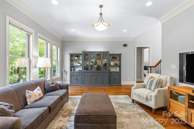 6211 Cruden Bay Way, Charlotte, NC 28277 - living room featuring light wood-style flooring, ornamental molding, stairway, and recessed lighting