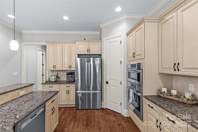 6211 Cruden Bay Way, Charlotte, NC 28277 - kitchen with stainless steel appliances, cream cabinetry, backsplash, dark stone counters, and recessed lighting