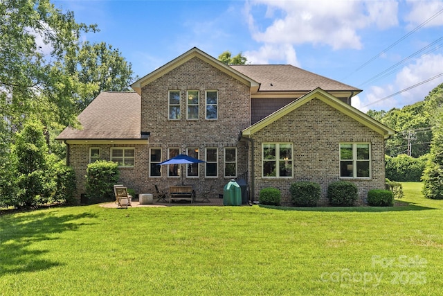6211 Cruden Bay Way, Charlotte, NC 28277 - rear view of house featuring brick siding, a yard, and a patio