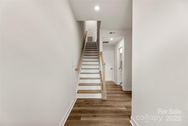 3748 Ellington St, Charlotte, NC 28211 - stairs featuring baseboards, wood finished floors, and recessed lighting
