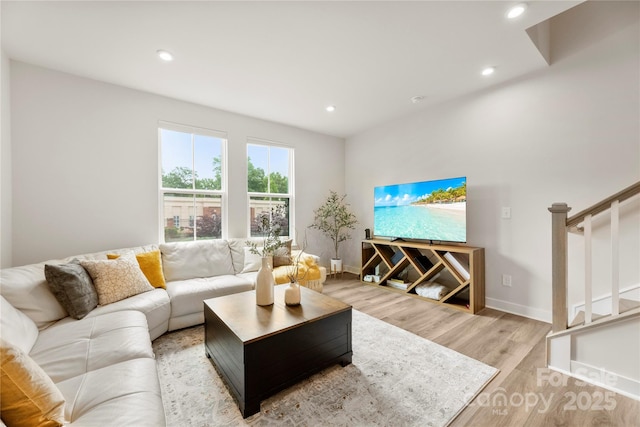 3748 Ellington St, Charlotte, NC 28211 - living area featuring stairway, light wood-style floors, recessed lighting, and baseboards