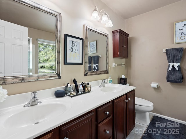1051 Streamlet Way, Monroe, NC 28110 - full bath with double vanity, toilet, tile patterned flooring, and baseboards