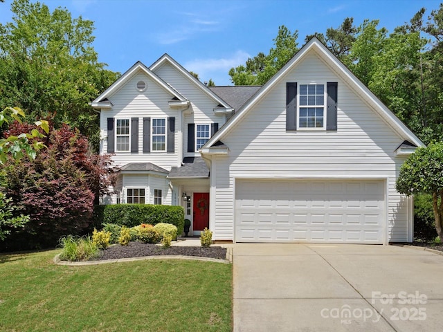 1051 Streamlet Way, Monroe, NC 28110 - traditional-style house featuring concrete driveway, a garage, and a front lawn
