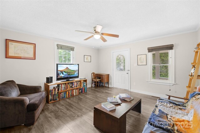 485 Lincoln St, Cramerton, NC 28032 - living area featuring crown molding, wood finished floors, a ceiling fan, and baseboards