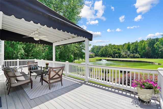 19946 River Falls Dr, Davidson, NC 28036 - wooden deck with a water view, ceiling fan, an outdoor hangout area, and view of wooded area