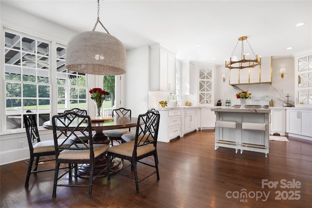 19946 River Falls Dr, Davidson, NC 28036 - dining room with dark wood finished floors, recessed lighting, and a chandelier