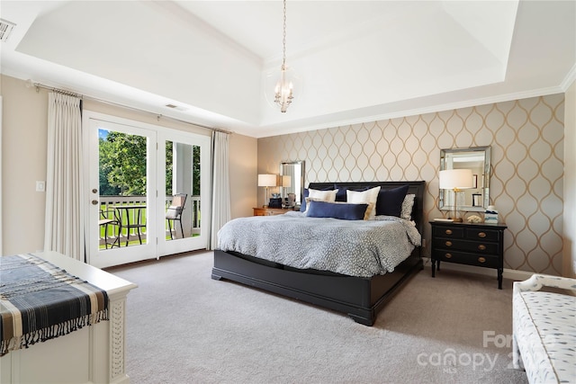 19946 River Falls Dr, Davidson, NC 28036 - bedroom featuring a tray ceiling, access to exterior, ornamental molding, carpet, and a chandelier
