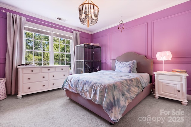 19946 River Falls Dr, Davidson, NC 28036 - bedroom with carpet flooring, a chandelier, a decorative wall, and ornamental molding