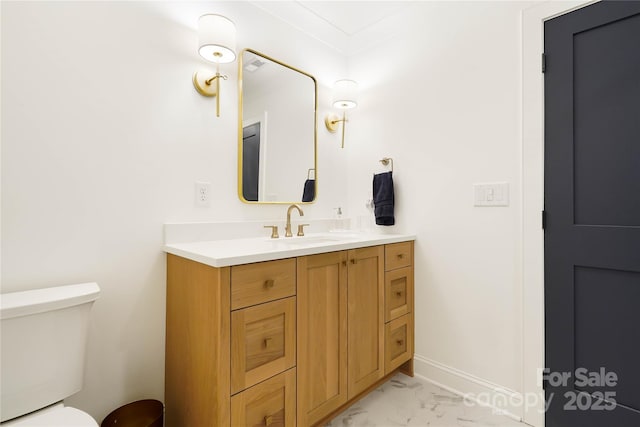 19946 River Falls Dr, Davidson, NC 28036 - bathroom featuring marble finish flooring, vanity, toilet, and baseboards