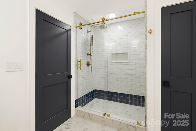 19946 River Falls Dr, Davidson, NC 28036 - bathroom with a stall shower and marble look tiles