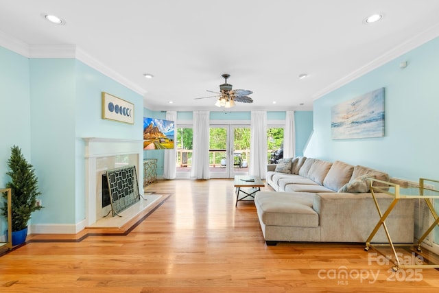 4120 Lake Shore Rd S, Denver, NC 28037 - living area featuring crown molding, light wood finished floors, ceiling fan, recessed lighting, and a high end fireplace