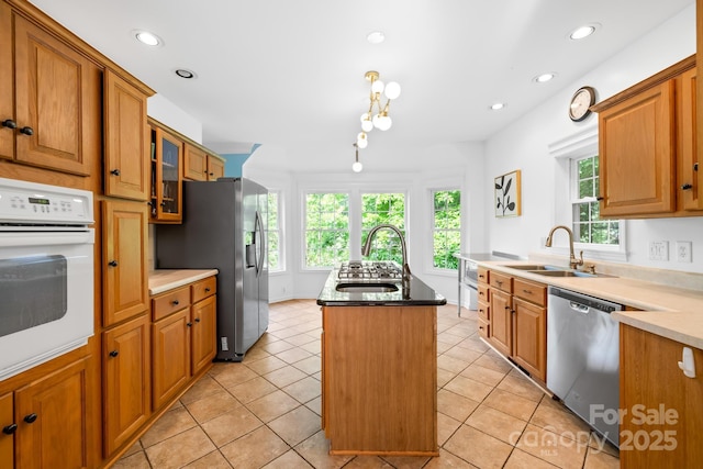 4120 Lake Shore Rd S, Denver, NC 28037 - kitchen featuring appliances with stainless steel finishes, a kitchen island with sink, plenty of natural light, recessed lighting, and a sink