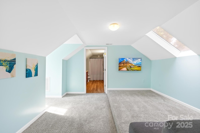 4120 Lake Shore Rd S, Denver, NC 28037 - additional living space with carpet, a skylight, lofted ceiling, and baseboards