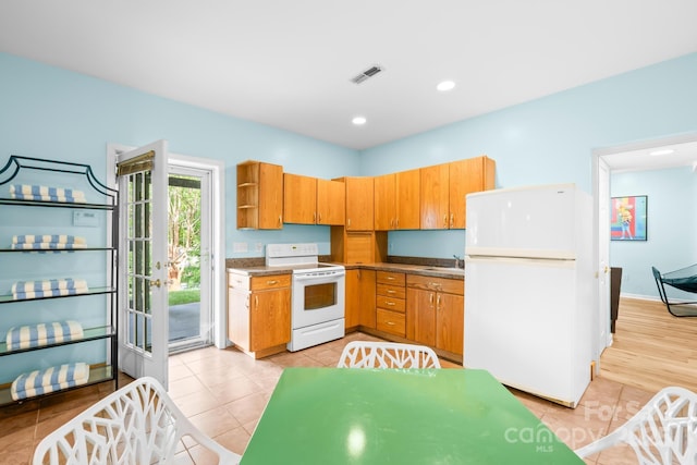 4120 Lake Shore Rd S, Denver, NC 28037 - kitchen with white appliances, light tile patterned floors, open shelves, recessed lighting, and a sink