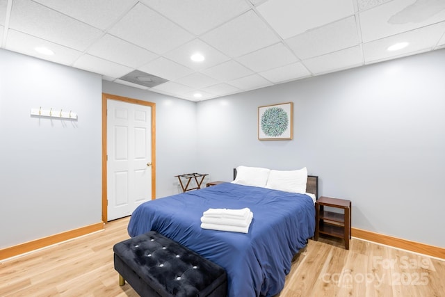 4120 Lake Shore Rd S, Denver, NC 28037 - bedroom featuring baseboards, wood finished floors, recessed lighting, and a drop ceiling