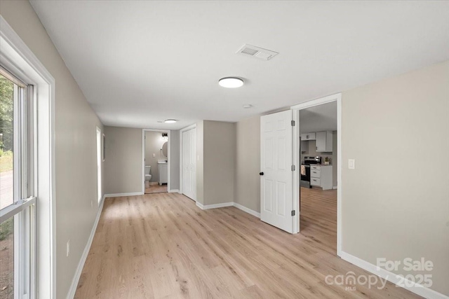 1746 2nd Street Pl SW, Hickory, NC 28602 - spare room with light wood-type flooring and baseboards