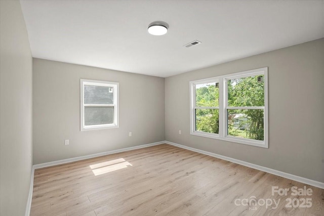 1746 2nd Street Pl SW, Hickory, NC 28602 - empty room featuring light wood finished floors and baseboards
