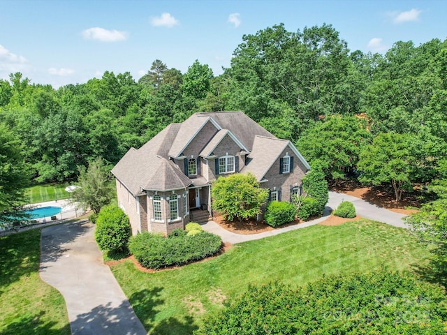 1508 Avalon Oaks Ct, Dallas, NC 28034 - view of front facade with brick siding and a front lawn