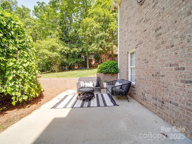 1508 Avalon Oaks Ct, Dallas, NC 28034 - view of patio / terrace with an outdoor living space with a fire pit