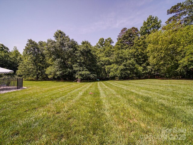 1508 Avalon Oaks Ct, Dallas, NC 28034 - view of yard with a wooded view