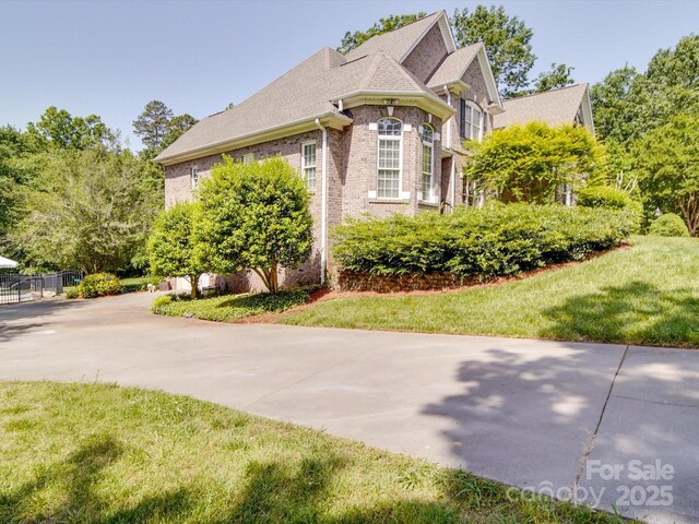 1508 Avalon Oaks Ct, Dallas, NC 28034 - view of property exterior featuring brick siding and concrete driveway
