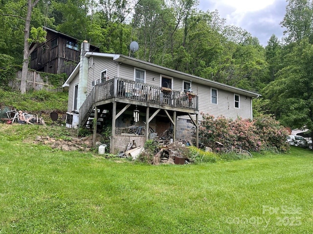 125 Parker Cove Rd, Weaverville, NC 28787 - rear view of house featuring a deck, a yard, a wooded view, and stairway