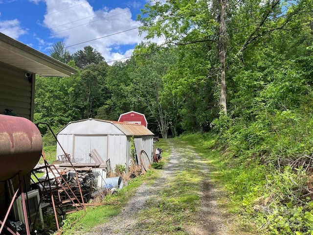 125 Parker Cove Rd, Weaverville, NC 28787 - view of street featuring a wooded view