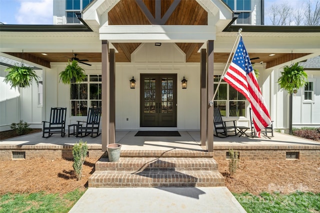 722 Clegg Farm Dr, York, SC 29745 - property entrance featuring french doors, a porch, board and batten siding, and ceiling fan