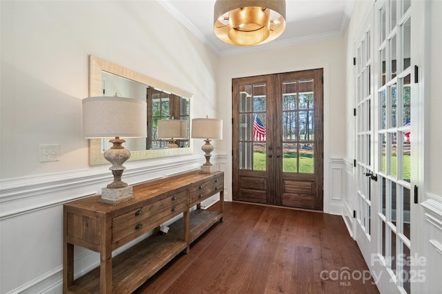 722 Clegg Farm Dr, York, SC 29745 - foyer entrance with french doors, ornamental molding, wood finished floors, a wainscoted wall, and a decorative wall