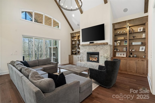 722 Clegg Farm Dr, York, SC 29745 - living area featuring high vaulted ceiling, baseboards, dark wood finished floors, a fireplace, and a chandelier