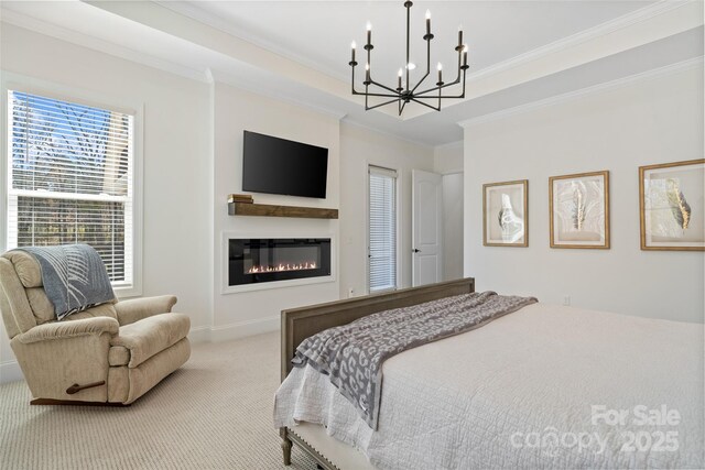 722 Clegg Farm Dr, York, SC 29745 - bedroom featuring light carpet, crown molding, a chandelier, and a glass covered fireplace