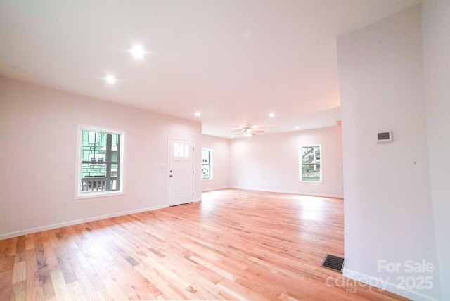 7 Berry Crest Ln, Arden, NC 28704 - spare room featuring healthy amount of natural light, light wood-style floors, recessed lighting, baseboards, and ceiling fan