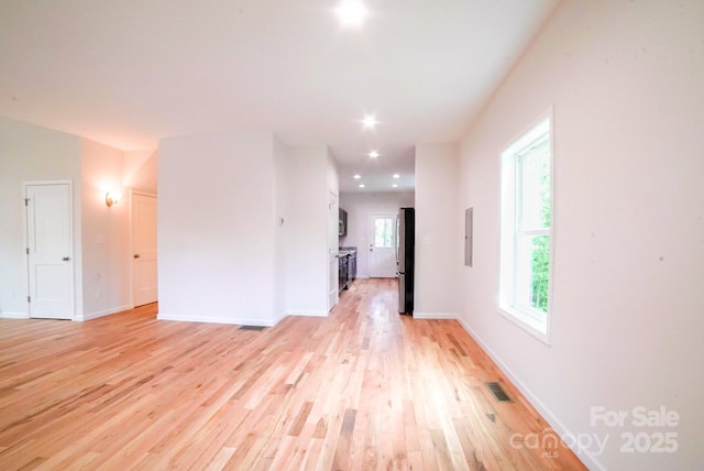 7 Berry Crest Ln, Arden, NC 28704 - unfurnished room featuring healthy amount of natural light, light wood-style flooring, and baseboards