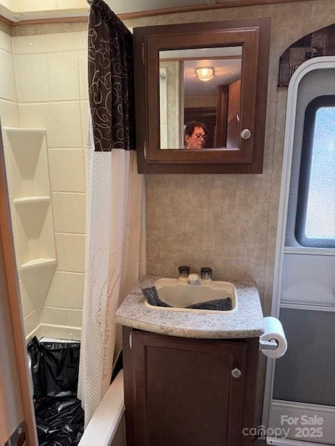 131 Twin Bluff Trl, Mount Gilead, NC 27306 - bathroom featuring vanity and curtained shower