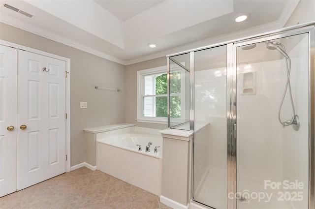1147 Anduin Falls Dr, Charlotte, NC 28269 - bathroom featuring a stall shower, a bath, crown molding, recessed lighting, and tile patterned floors