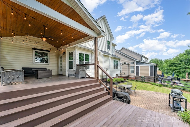 1147 Anduin Falls Dr, Charlotte, NC 28269 - deck featuring a ceiling fan, outdoor dining space, and an outdoor hangout area