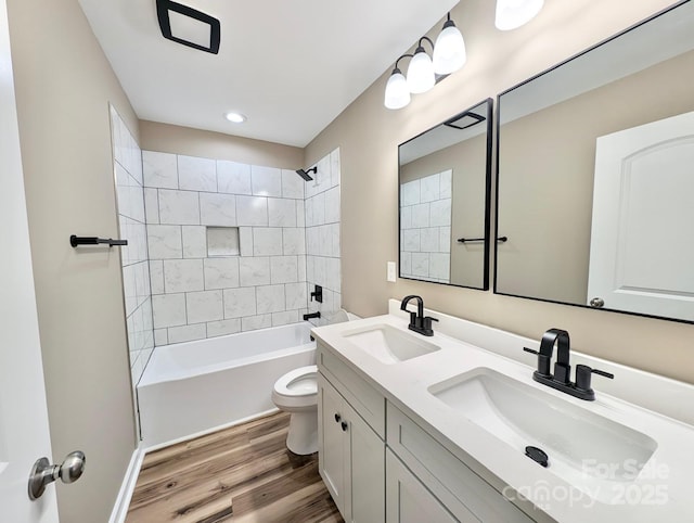 6756 Denver Heights Cir, Denver, NC 28037 - full bath featuring toilet, wood finished floors, shower / bath combination, double vanity, and recessed lighting